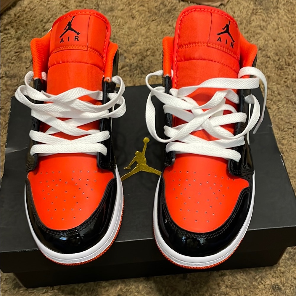 Jordan Sneakers - Bold Black and Vibrant Orange ( in very new condition)